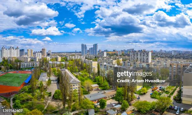 residential district at left bank of kyiv city. green spring season - stadium general view stock pictures, royalty-free photos & images