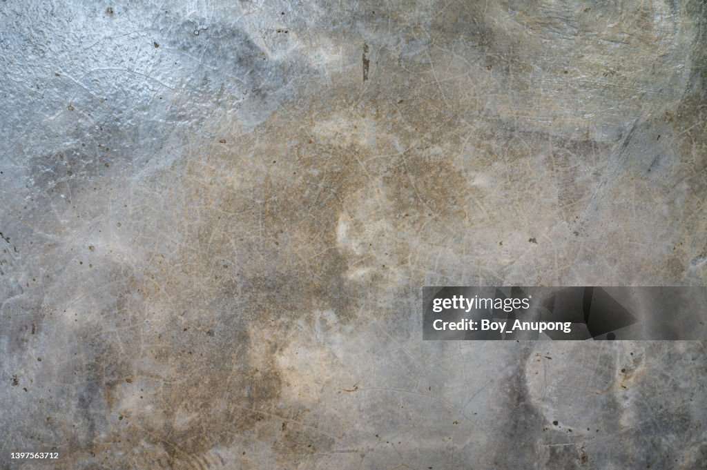 Texture of an old gray concrete wall use as background.