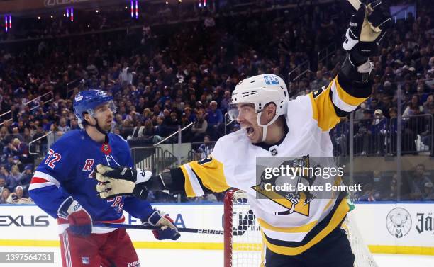 Evan Rodrigues of the Pittsburgh Penguins scores a second period shorthanded goal against Igor Shesterkin of the New York Rangers in Game Seven of...