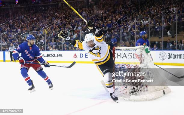 Evan Rodrigues of the Pittsburgh Penguins scores a second period shorthanded goal against Igor Shesterkin of the New York Rangers in Game Seven of...