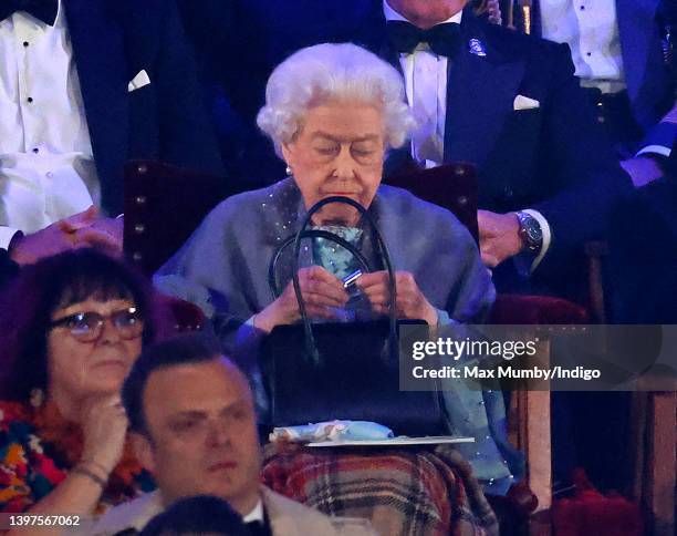 Queen Elizabeth II attends the 'A Gallop Through History' performance, part of the official celebrations for Queen Elizabeth II's Platinum Jubilee...