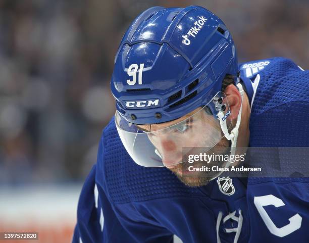 John Tavares of the Toronto Maple Leafs gets set for a faceoff against the Tampa Bay Lightning during Game Seven of the First Round of the 2022...