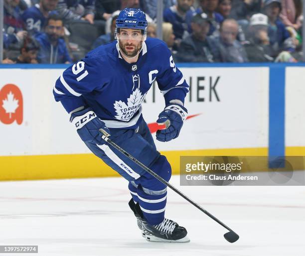 John Tavares of the Toronto Maple Leafs skates against the Tampa Bay Lightning during Game Seven of the First Round of the 2022 Stanley Cup Playoffs...