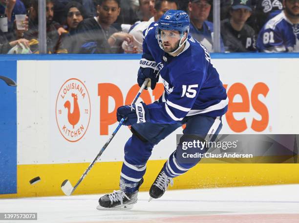 Alexander Kerfoot of the Toronto Maple Leafs grabs a puck against the Tampa Bay Lightning during Game Seven of the First Round of the 2022 Stanley...