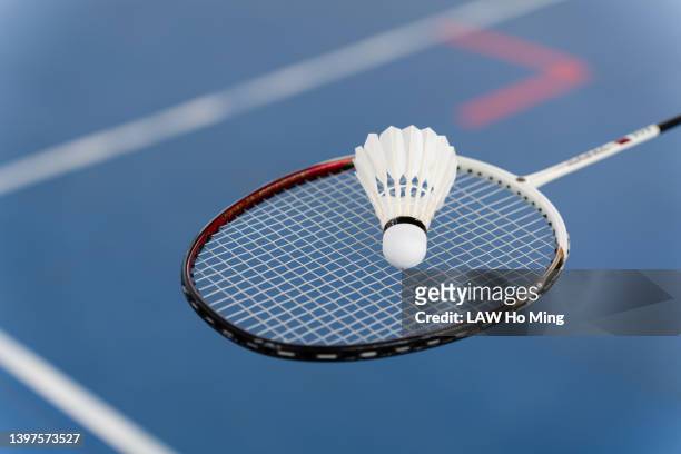 badminton on the racket - badminton stock pictures, royalty-free photos & images