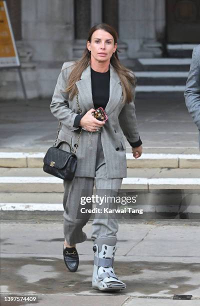 Coleen Rooney departs the Royal Courts of Justice, Strand on May 16, 2022 in London, England. Coleen Rooney, wife of Derby County manager Wayne...