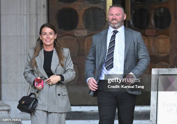 Coleen Rooney and Wayne Rooney depart the Royal Courts of Justice, Strand on May 16, 2022 in London, England. Coleen Rooney, wife of Derby County...