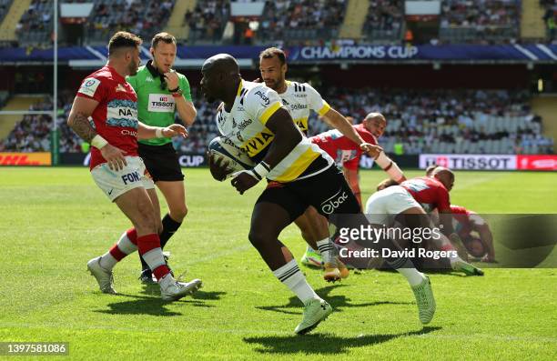 Raymond Rhule of La Rochelle breaks with the ball, but his effort was disallowed during the Heineken Champions Cup Semi Final match between Racing 92...