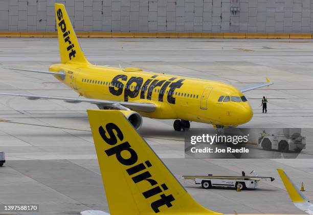 Spirit Airlines plane is prepared for a flight at the Fort Lauderdale-Hollywood International Airport on May 16, 2022 in Fort Lauderdale, Florida....