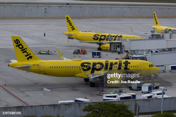 Spirit Airlines planes are prepared for flight at the Fort Lauderdale-Hollywood International Airport on May 16, 2022 in Fort Lauderdale, Florida....