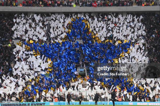 Fans of Newcastle United display a tifo with a blue star in the Leazes End prior to the Premier League match between Newcastle United and Arsenal at...