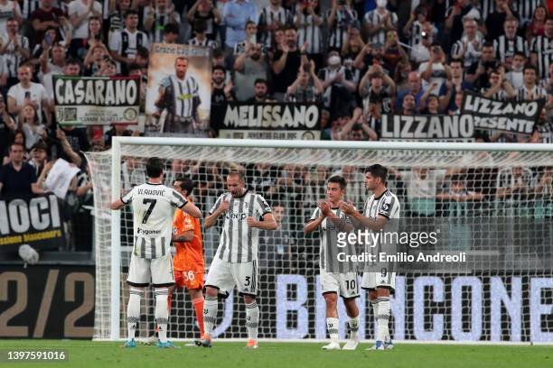 Dusan Vlahovic, Paulo Dybala and Alvaro Morata of Juventus applaud Giorgio Chiellini of Juventus as he is substituted off during the Serie A match...