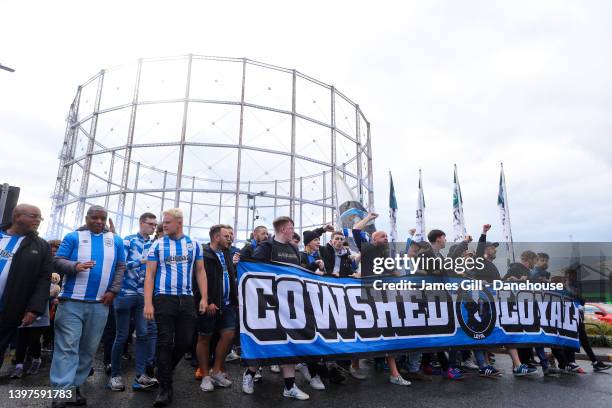 Huddersfield supporters march to the stadium prior to the Sky Bet Championship Play-Off Semi Final 2nd Leg match between Huddersfield Town and Luton...