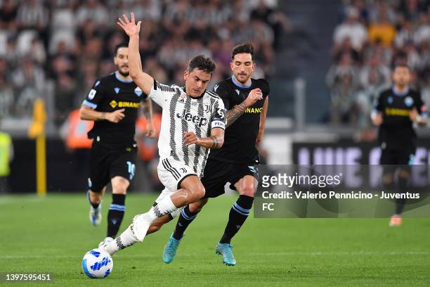 Paulo Dybala of Juventus competes for the ball during the Serie A match between Juventus and SS Lazio at Allianz Stadium on May 16, 2022 in Turin,...