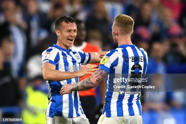 Jonathan Hoog of Huddersfield Town celebrates with his team mate Lewis O'Brien after winning the Sky Bet Championship Play-Off Semi Final 2nd Leg...