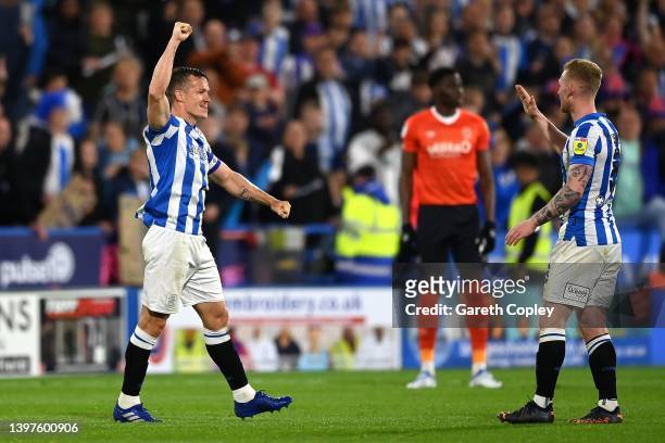Jonathan Hoog of Huddersfield Town celebrates with his team mate Lewis O'Brien after winning the Sky Bet Championship Play-Off Semi Final 2nd Leg...