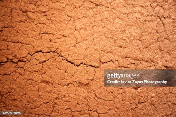 full frame shot of cracked land - mud stock pictures, royalty-free photos & images