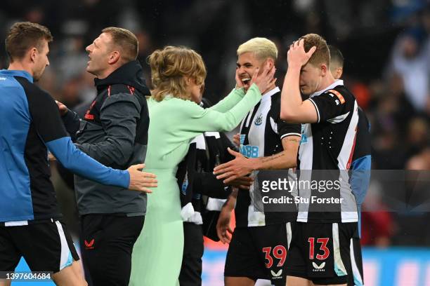 Amanda Staveley, Director of Newcastle United celebrates with Bruno Guimaraes of Newcastle United following their victory in the Premier League match...