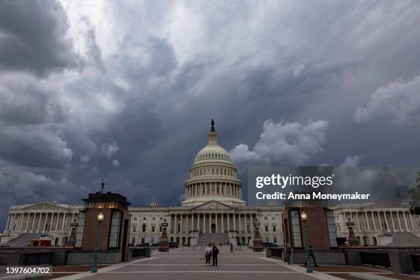 Storm cloud hangs over the U.S. Capitol Building on May 16, 2022 in Washington, DC. This week the U.S. Senate is expected to take up a vote on a $40...