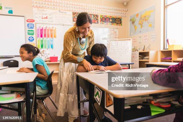 female elementary teacher teaching - native american reservation stock pictures, royalty-free photos & images