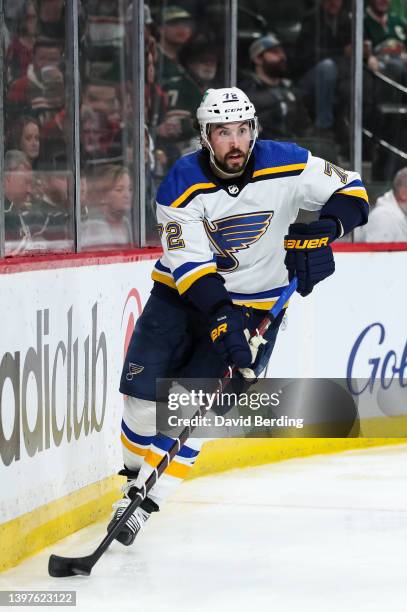 Justin Faulk of the St. Louis Blues skates with the puck against the Minnesota Wild in the second period in Game Five of the First Round of the 2022...