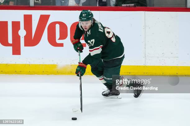 Kirill Kaprizov of the Minnesota Wild skates with the puck against the St. Louis Blues in the third period in Game Five of the First Round of the...