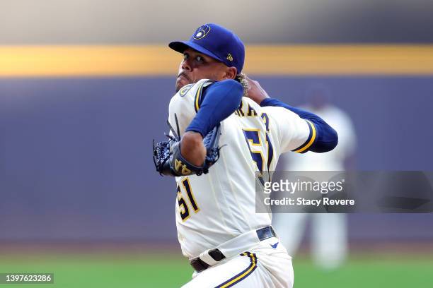 Freddy Peralta of the Milwaukee Brewers throws a pitch during the first inning against the Atlanta Braves at American Family Field on May 16, 2022 in...
