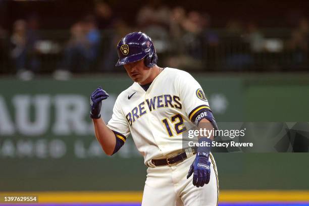 Hunter Renfroe of the Milwaukee Brewers reacts after hitting a double during the sixth inning against the Atlanta Braves at American Family Field on...