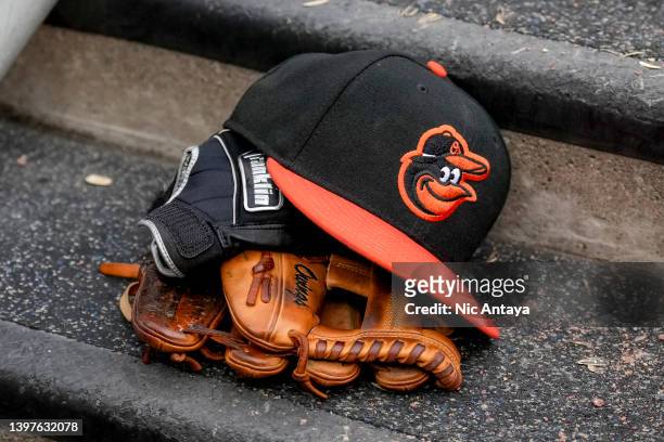 Baltimore Orioles hat is pictured with Franklin batting gloves during the game against the Detroit Tigers at Comerica Park on May 14, 2022 in...