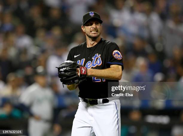 Max Scherzer of the New York Mets reacts against the Seattle Mariners at Citi Field on May 13, 2022 in the Flushing neighborhood of the Queens...