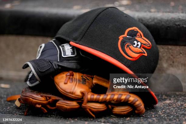 Baltimore Orioles hat is pictured with Franklin batting gloves during the game against the Detroit Tigers at Comerica Park on May 14, 2022 in...