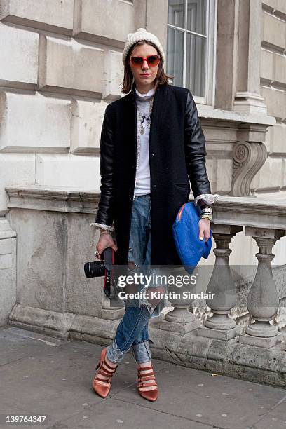 Fashion intern Kailey Kramer wearing J crew shoes, Claire Vivier clutch, Sandro Jacket, Maple jeans, Vintage tweed jacket, hat from grandmother...