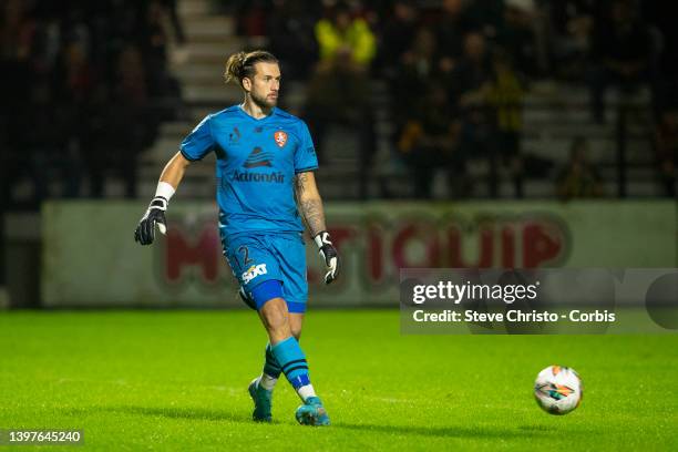 Jordan Holmes of the Roar clears the ball during the Australia Cup Playoff match between the Western Sydney Wanderers and the Brisbane Roar at...