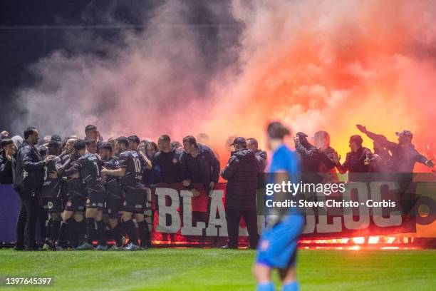 General view flares from the RBB as the Wanderers celebrate a goal from Jarrod Carluccio during the Australia Cup Playoff match between the Western...