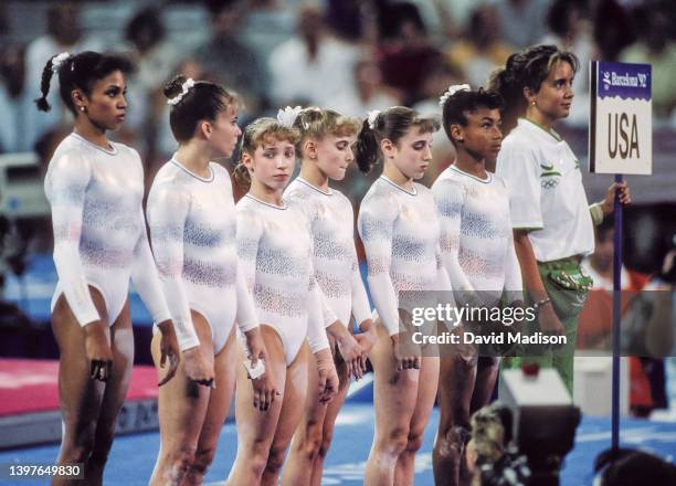 The team from the United States prepare to compete on July 28, 1992 during the Team All-Around event of the Women's Gymnastics competition of the...