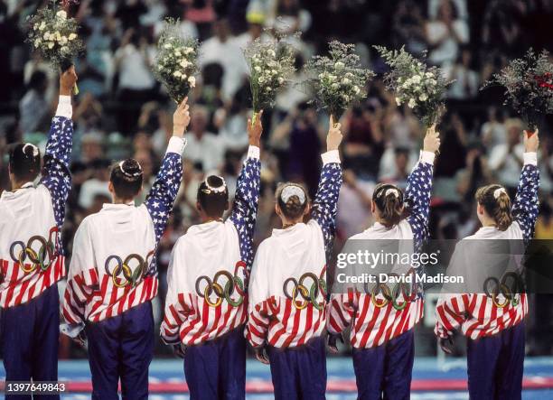 The team from the United States prepare to compete on July 28, 1992 during the Team All-Around event of the Women's Gymnastics competition of the...