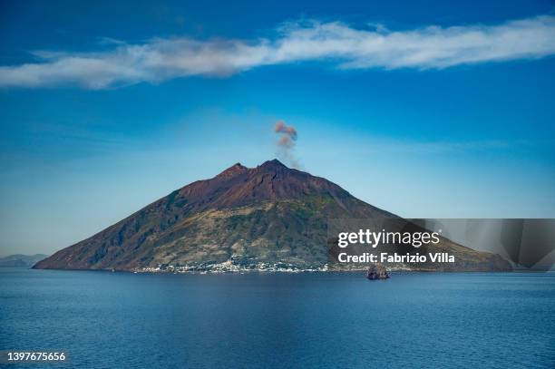 Aerial view, from a helicopter, of the Stromboli volcano, one of the most active volcanoes in the world, during an explosion with gas and ash...