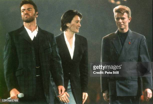 George Michael, kd Lang and David Bowie on stage at the 'Concert Of Hope' at Wembley Arena on December 1st, 1993 in London, England.