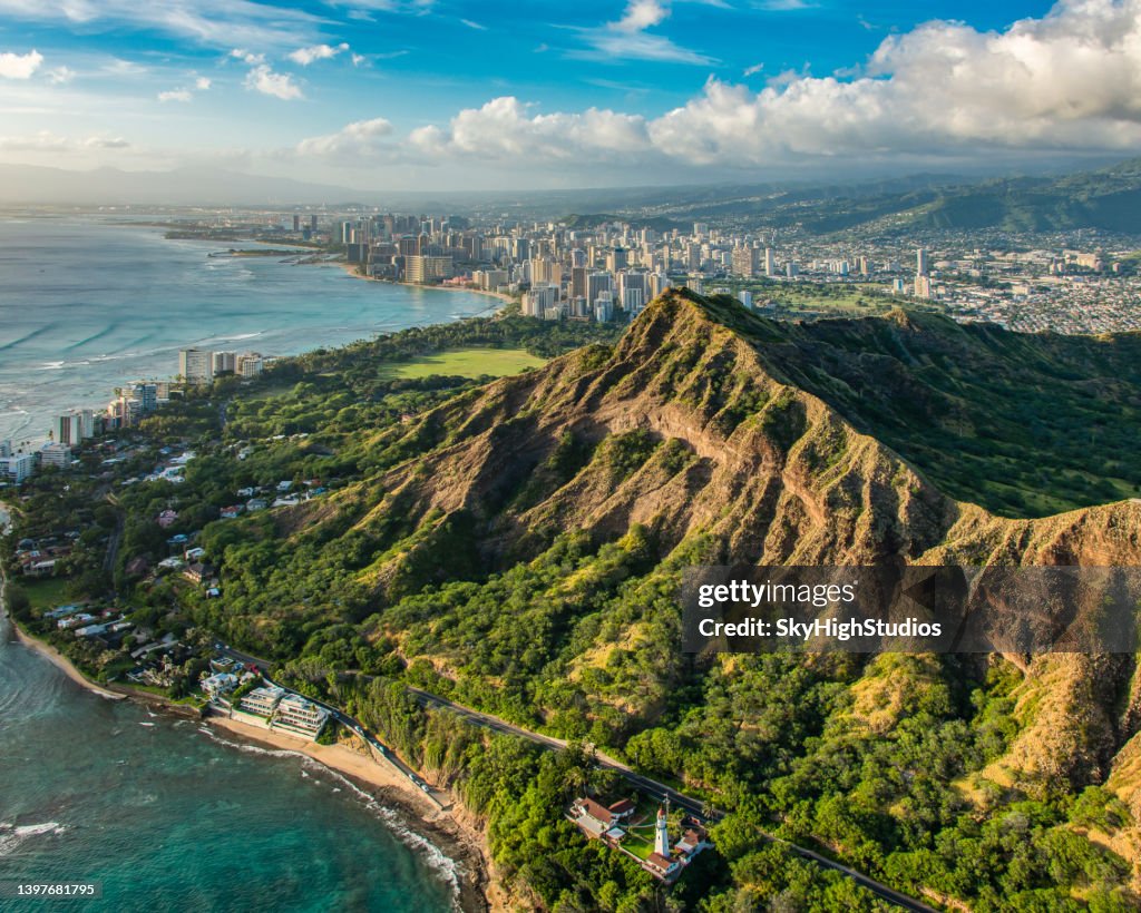 Aerial View Of Diamond Head Crater With Honolulu Cityscape In The aerial-view-of-diamond-head-crater-with-honolulu-cityscape-in-the