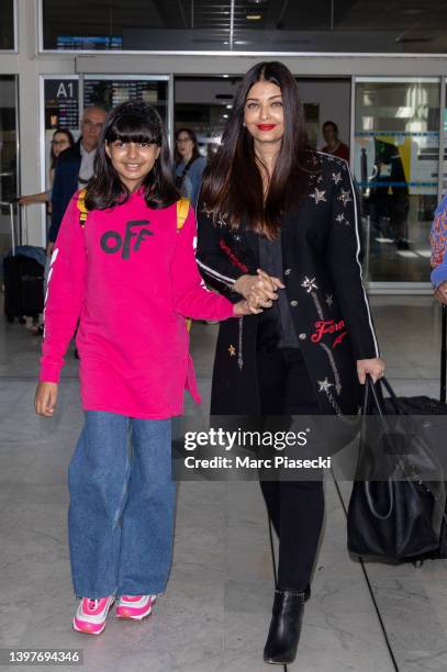 Actress Aishwarya Rai and daughter Aaradhya Bachchan are seen arriving ahead of the 75th annual Cannes film festival at Nice Airport on May 17, 2022...