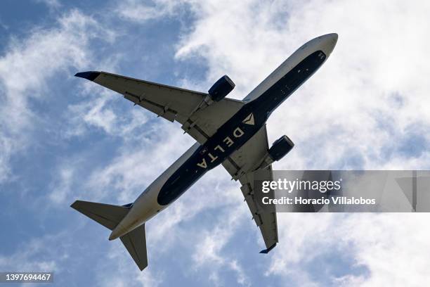 Delta Airlines airplane takes off from Humberto Delgado International Airport on May 17 in Lisbon, Portugal. New economic forecasting by the European...