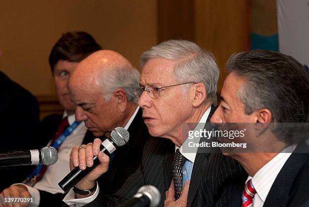Charles Dallara, managing director of the Institute of International Finance , second from right, speaks while Manuel Medina-Mora, chief executive...