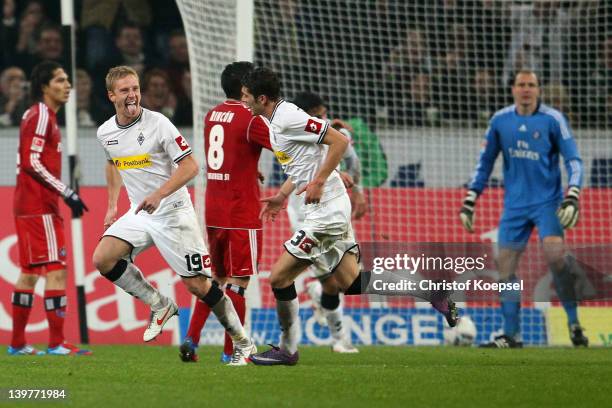 Mike Hanke of Moenchengladbach celebrates the first goal with Roman Neustaedter during the Bundesliga match between Borussia Moenchengladbach and...