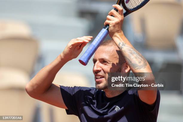 May 17. Daniel Evans of Great Britain reacts while training on Court Suzanne Lenglen in preparation for the 2022 French Open Tennis Tournament at...