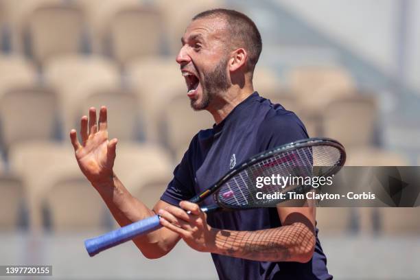 May 17. Daniel Evans of Great Britain reacts while training on Court Suzanne Lenglen in preparation for the 2022 French Open Tennis Tournament at...