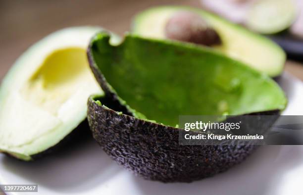 avocado skin - avocado stock pictures, royalty-free photos & images