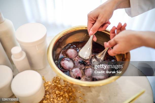 wellness products and frosted skin care - jojoba stock pictures, royalty-free photos & images