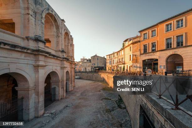 street view and historical buildings in arles, provence, france - arles stock pictures, royalty-free photos & images