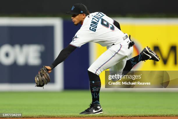 Erik Gonzalez of the Miami Marlins fields a ground ball against the Washington Nationals at loanDepot park on May 16, 2022 in Miami, Florida.