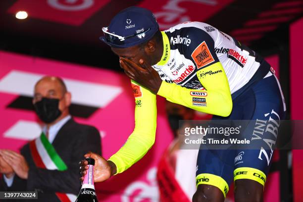 Hailu Biniam Girmay of Eritrea and Team Intermarché - Wanty - Gobert Matériaux the stage winner after having an accident with the Astoria champagne...